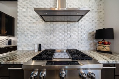 Experience desert luxury living in this impeccably reimagined 4