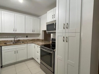 Rarely available ground floor condo unit! The best water view in