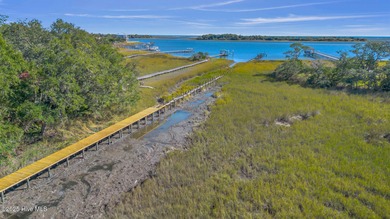 Experience elevated coastal living at 1624 Sunrise Lane in