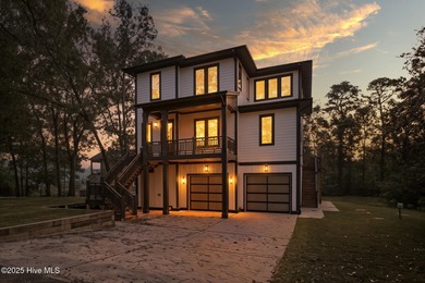 Experience elevated coastal living at 1624 Sunrise Lane in