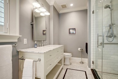 Experience elevated living in the heart of Charleston's French