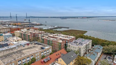 Experience elevated living in the heart of Charleston's French