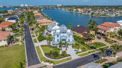 Welcome to this exceptional elevated Key West style 4-bedroom
