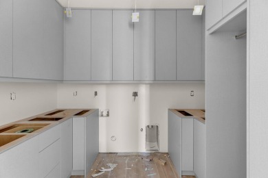 Defined by its architectural prowess and unique style, this home