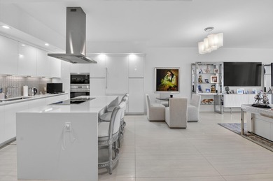 Dazzling golf and sparkling lake views await in this stunning