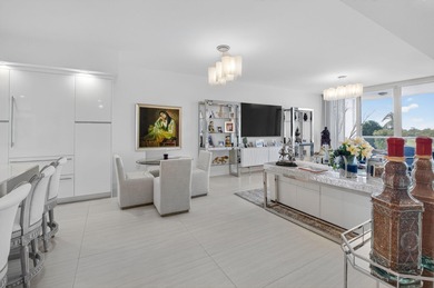 Dazzling golf and sparkling lake views await in this stunning