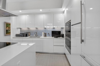 Dazzling golf and sparkling lake views await in this stunning