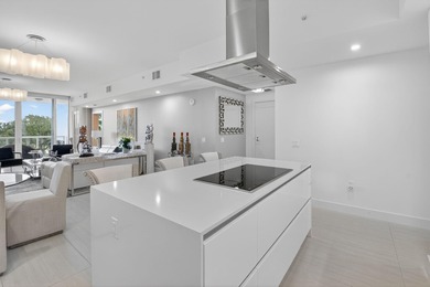 Dazzling golf and sparkling lake views await in this stunning