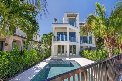 RARE OPPORTUNITY TO OWN A STUNNING 3-STORY MASTERPIECE ON THE