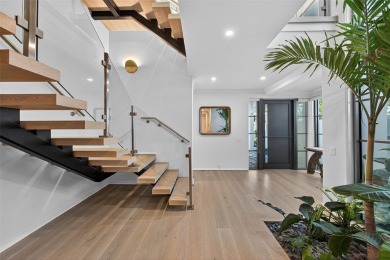 RARE OPPORTUNITY TO OWN A STUNNING 3-STORY MASTERPIECE ON THE