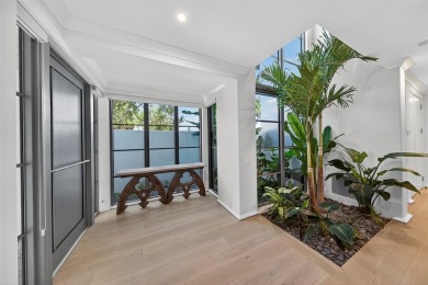 RARE OPPORTUNITY TO OWN A STUNNING 3-STORY MASTERPIECE ON THE