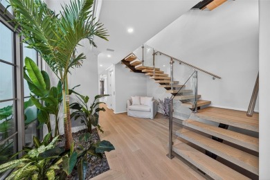 RARE OPPORTUNITY TO OWN A STUNNING 3-STORY MASTERPIECE ON THE