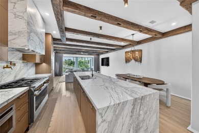 RARE OPPORTUNITY TO OWN A STUNNING 3-STORY MASTERPIECE ON THE