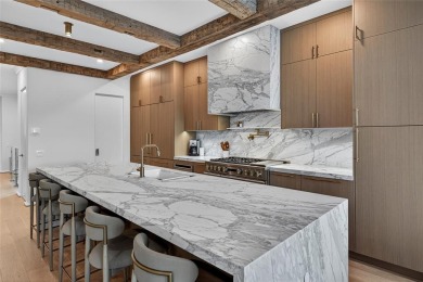 RARE OPPORTUNITY TO OWN A STUNNING 3-STORY MASTERPIECE ON THE