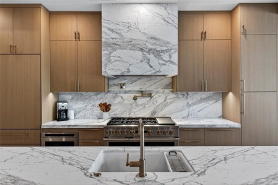 RARE OPPORTUNITY TO OWN A STUNNING 3-STORY MASTERPIECE ON THE