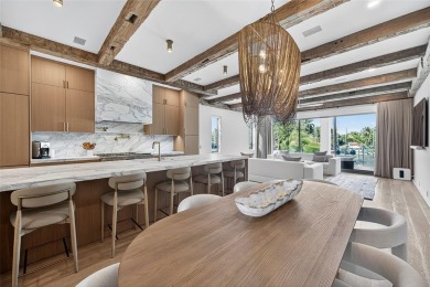 RARE OPPORTUNITY TO OWN A STUNNING 3-STORY MASTERPIECE ON THE