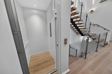 RARE OPPORTUNITY TO OWN A STUNNING 3-STORY MASTERPIECE ON THE