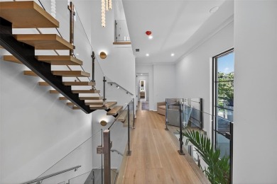 RARE OPPORTUNITY TO OWN A STUNNING 3-STORY MASTERPIECE ON THE