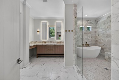 RARE OPPORTUNITY TO OWN A STUNNING 3-STORY MASTERPIECE ON THE