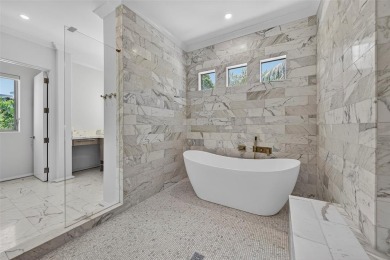 RARE OPPORTUNITY TO OWN A STUNNING 3-STORY MASTERPIECE ON THE