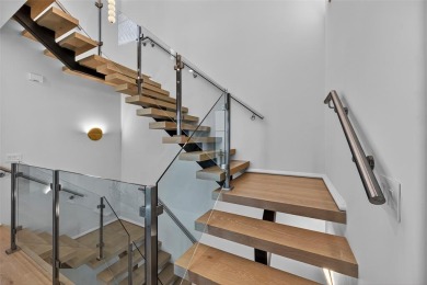 RARE OPPORTUNITY TO OWN A STUNNING 3-STORY MASTERPIECE ON THE