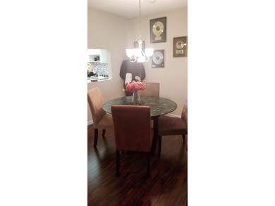 Ground floor, 2 bedroom condo with parking right by door. wood