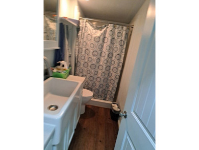 Located on 5 lovely cared for acres, this is a double wide