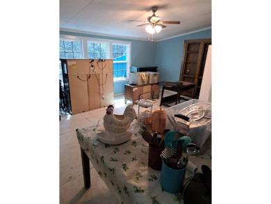 Located on 5 lovely cared for acres, this is a double wide