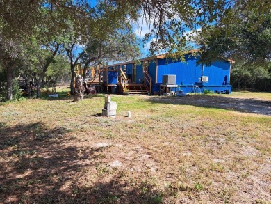 Located on 5 lovely cared for acres, this is a double wide
