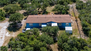 Located on 5 lovely cared for acres, this is a double wide