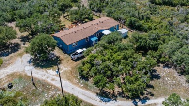 Located on 5 lovely cared for acres, this is a double wide