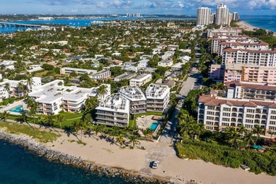 Enjoy sweeping south-facing views of the Palm Beach Inlet's