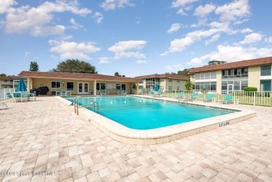 This beautiful 2 bedroom, 2 bath corner unit, ground-floor condo