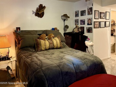 This beautiful 2 bedroom, 2 bath corner unit, ground-floor condo