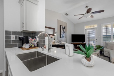 Stunning renovated end-unit condo is located next to the