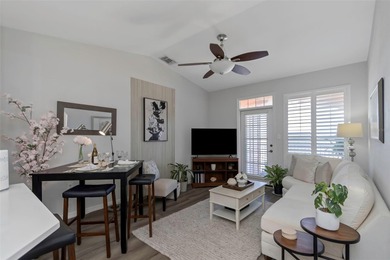 Stunning renovated end-unit condo is located next to the