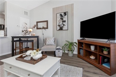 Stunning renovated end-unit condo is located next to the