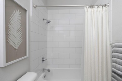 Stunning renovated end-unit condo is located next to the