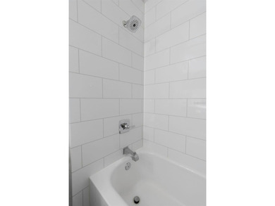 Stunning renovated end-unit condo is located next to the