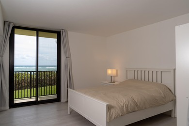 This spacious ocean end unit offers direct ocean views from its