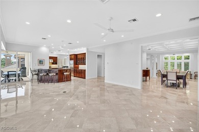 This exquisite canal front residence offers an exceptional