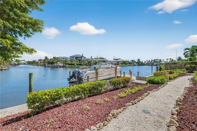 This exquisite canal front residence offers an exceptional