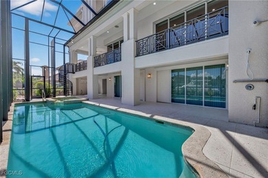 This exquisite canal front residence offers an exceptional