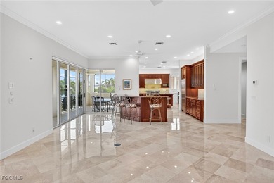 This exquisite canal front residence offers an exceptional