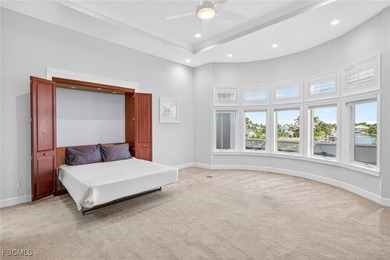 This exquisite canal front residence offers an exceptional