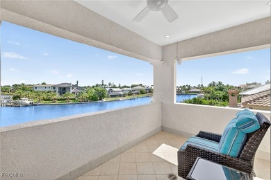 This exquisite canal front residence offers an exceptional