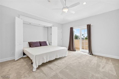 This exquisite canal front residence offers an exceptional