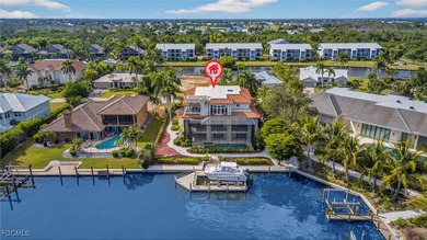 This exquisite canal front residence offers an exceptional