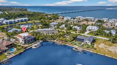 This exquisite canal front residence offers an exceptional