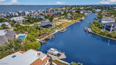 This exquisite canal front residence offers an exceptional